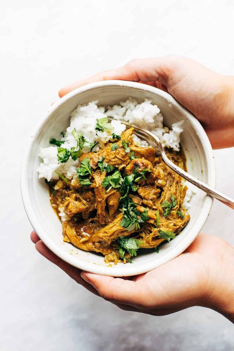 Coconut tandoori chicken in a bowl with rice.